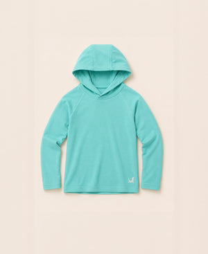 Turquoise hoodie on a beige background