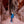 Small child standing in a narrow canyon with red rock walls